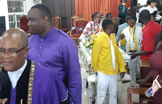 Pallbearers carrying the coffin with the body of Theresa Bryan (OH NEWS PHOTO)