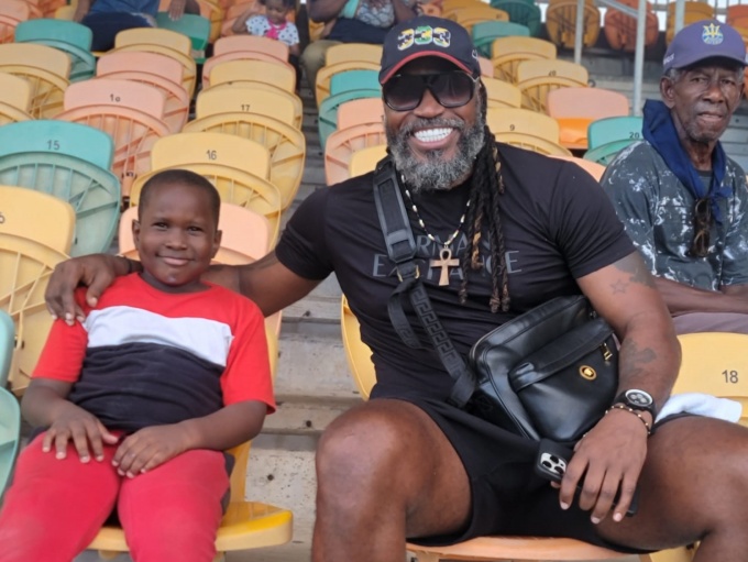 Jathniel Gray with West Indies legend Chris Gayle