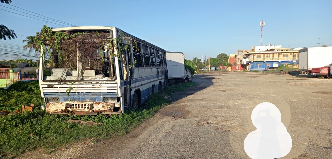 These old bus and truck have been at the entrance of Marlie Mount community for nearly 20 years. (OH News Photo)
