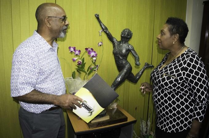 Basil Watson (left) and Jamaica culture minister Olivia Grange (Photo: Contributed)