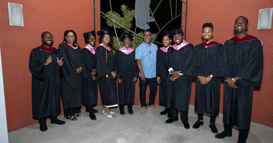 Celebrating the achievements are (from left) brass instructor Leon Ince; director of music Gay Magnus; valedictorian drummer/percussionist Jonathan Gordon; violinist/vocalist Zuri Aiko Gordon; commencement speaker and artiste manager Steve Wilson; percussionist Sanje Landell; commencement speaker Steve Wilson; keyboardist Matthew Reid; bass guitarist Alejandro Keating; senior music instructor Clayon Samuels and keyboard and technology instructor Evad Campbell.