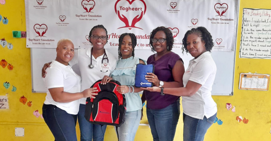 Dr Odette Thomas (2nd left) along with members of the TagHeart Foundation and teachers from Old Harbour Bay Primary School. (Contributed Photo)